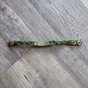 Green leather “moods” bracelet